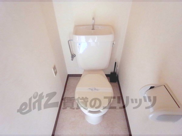 Toilet. Toilet and bath is divided.