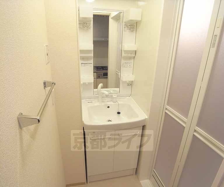 Washroom. Shampoo is Dresser.