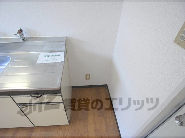 Other room space. Put in the kitchen next to space