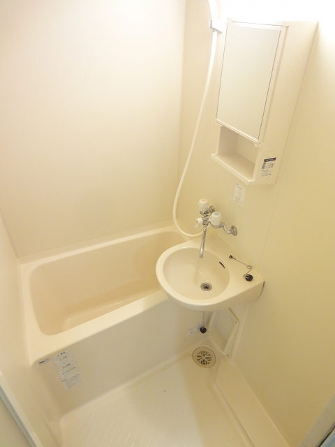 Bath. Separate bus type. It is a photograph of another room.