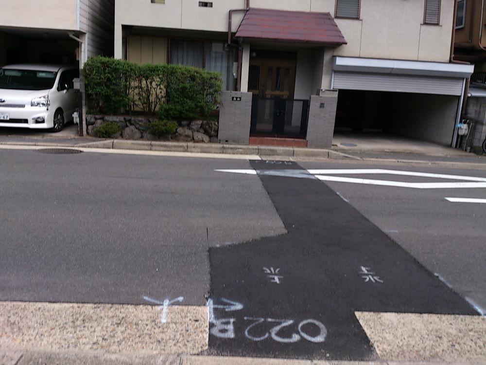 Parking lot. With shutter garage