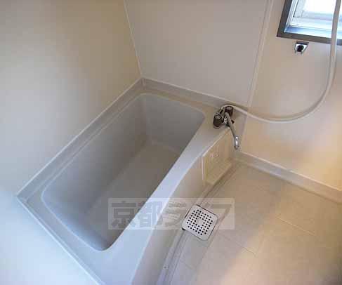 Bath. It also equipped with a small window in the bath