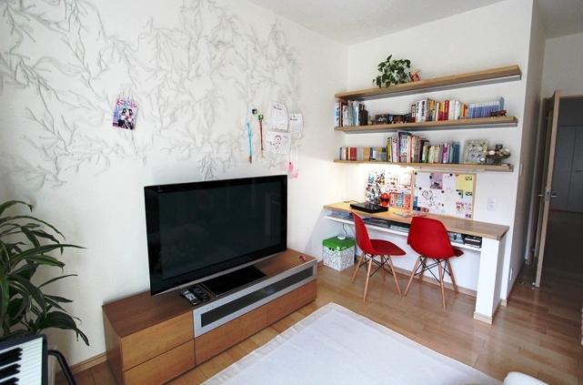 Other. Image is a photograph [Family gatherings in the living room study] 