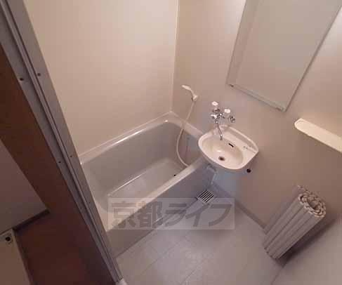 Bath. Tub is a little bigger. It is stuck slowly.