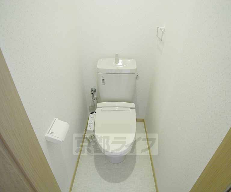 Toilet. It will calm pure white space
