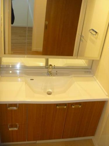 Washroom. It is a photograph of a different type floor plan.