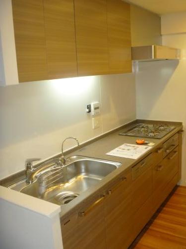 Kitchen. It is a photograph of a different type floor plan.