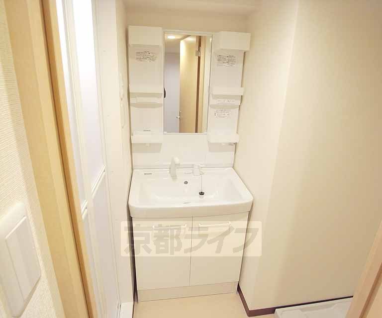 Washroom. Shampoo is Dresser.