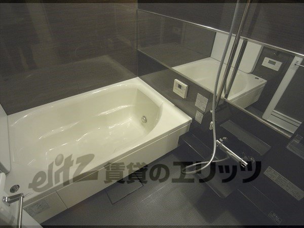 Bath. It felt more widely and more by the effect of a large mirror