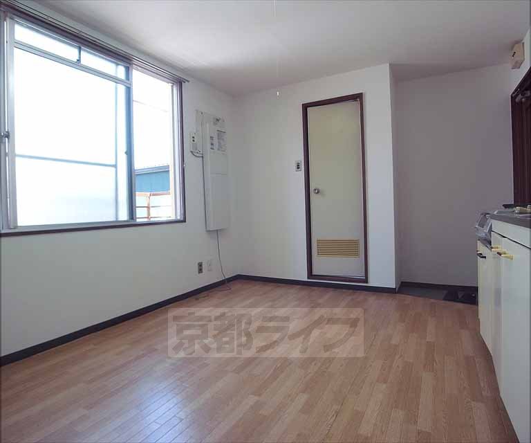 Living and room. This room is bright with large windows.