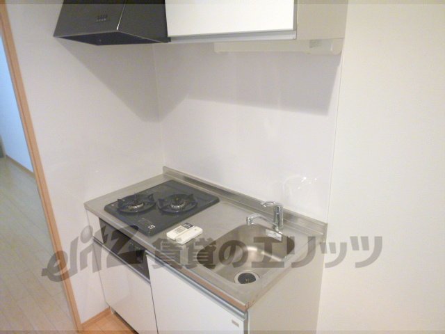 Kitchen. Two-burner stove is equipped with a kitchen.