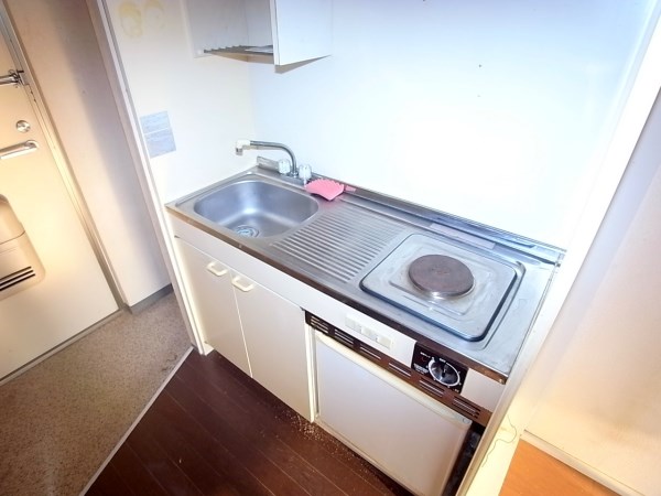 Kitchen. Kitchen table of one-burner stove with.