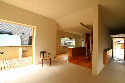 Kitchen. Wood deck and living space with a sense of unity