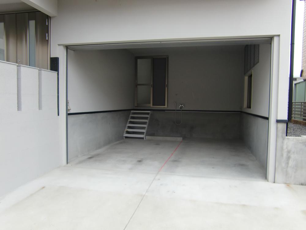 Parking lot. garage Washing place and shower faucet