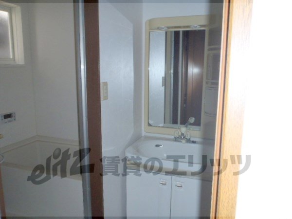 Washroom. With separate wash basin