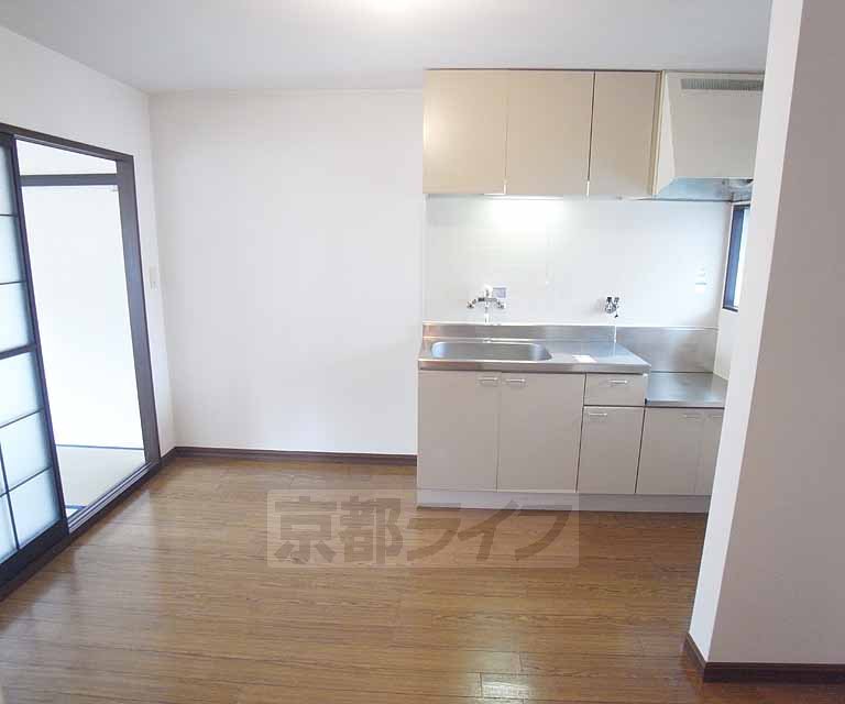 Living and room. In the kitchen next to, It is likely to put the refrigerator and cupboard.