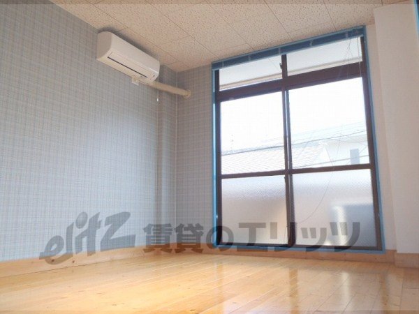 Living and room. The east side of the wall is cross light blue design.