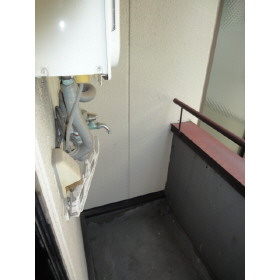 Balcony. Washing machine storage is here!