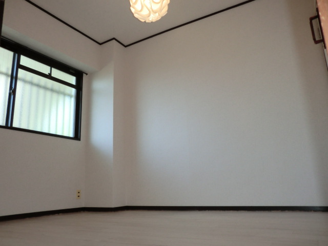 Other room space. The photograph is a separate room.