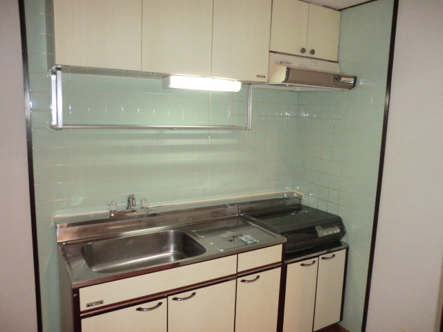 Kitchen. The photograph is a separate room.