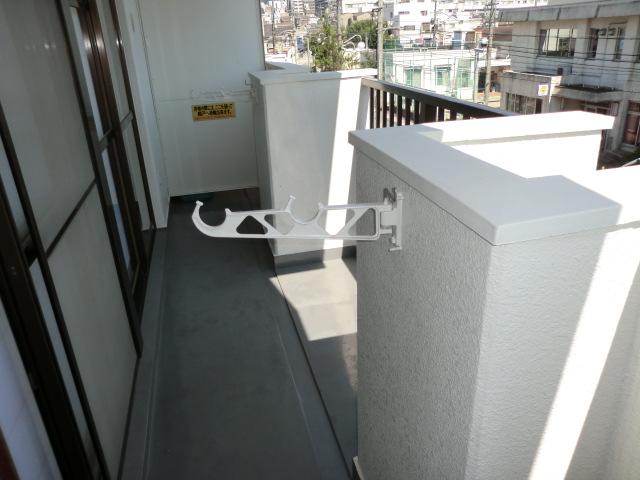 Balcony. The photograph is a separate room.