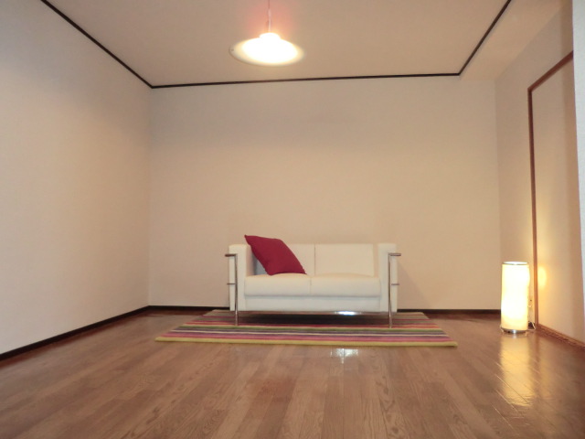 Living and room. The photograph is a separate room.