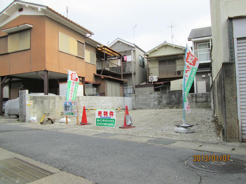 Local photos, including front road. Photo at the time of vacant lot