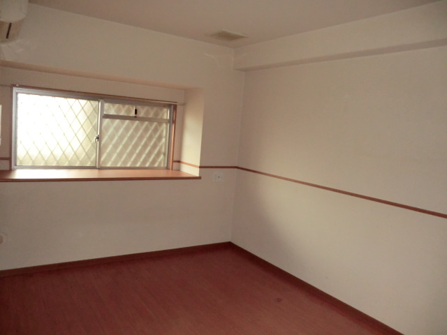 Other room space. The photograph is a separate room.