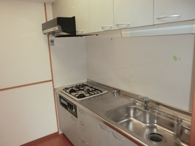 Kitchen. The photograph is a separate room.