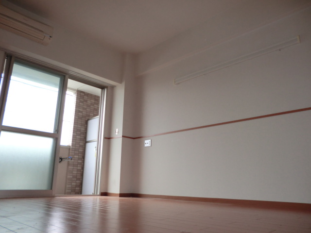 Other room space. The photograph is a separate room.