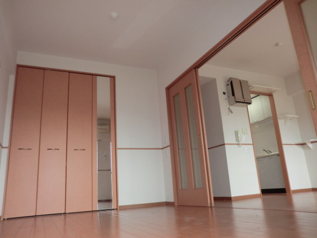 Living and room. The photograph is a separate room.