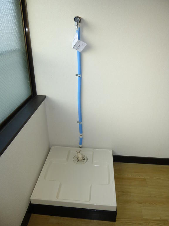 Other Equipment. Washing machine in the room