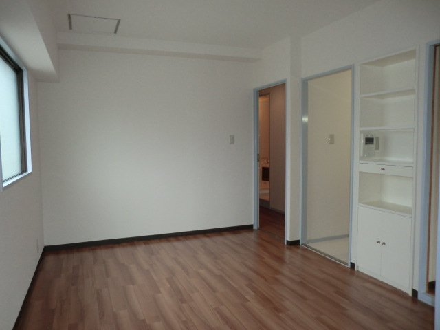 Living and room. The photograph is a separate room.