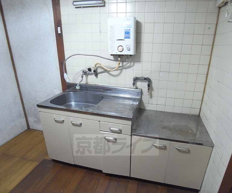 Kitchen. Also there are still water heater.