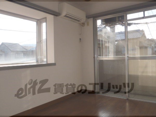 Living and room. There is a bay window on the south side