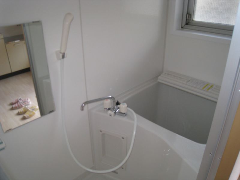 Bath. Bright bathroom with a window