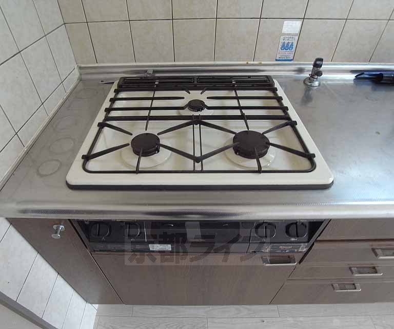 Kitchen. 3-neck is a stove.