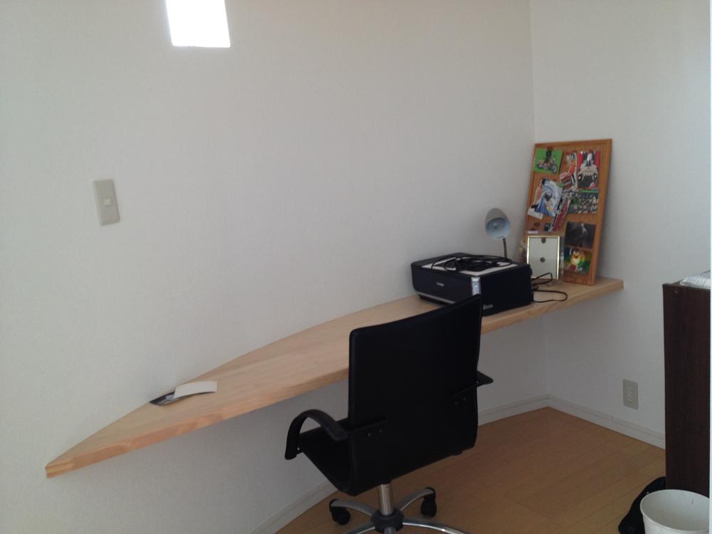 Non-living room. With Earl, Built-study space! The top is the atrium! 