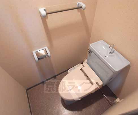 Toilet. Toilet is with a bidet.