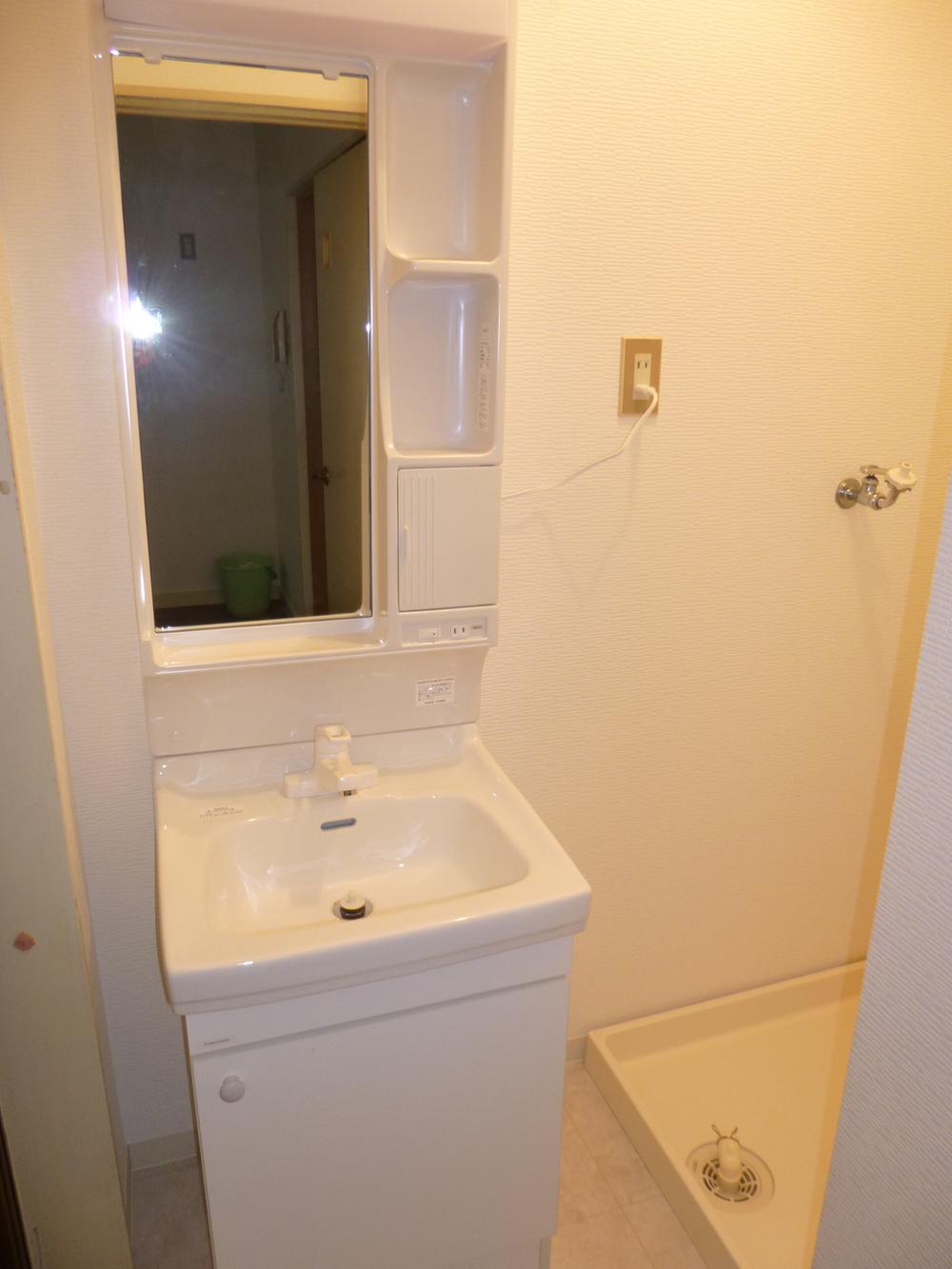 Wash basin, toilet. Basin had made