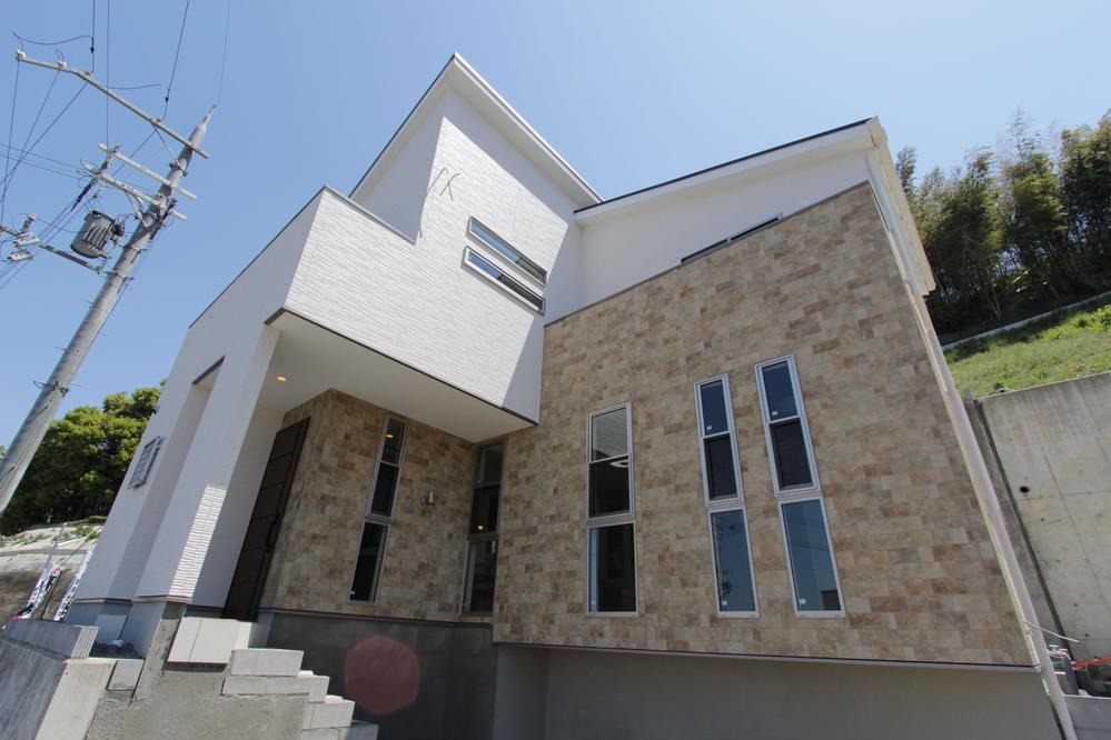 Local appearance photo. Model house towering on a hill spread is rich vista under eyes