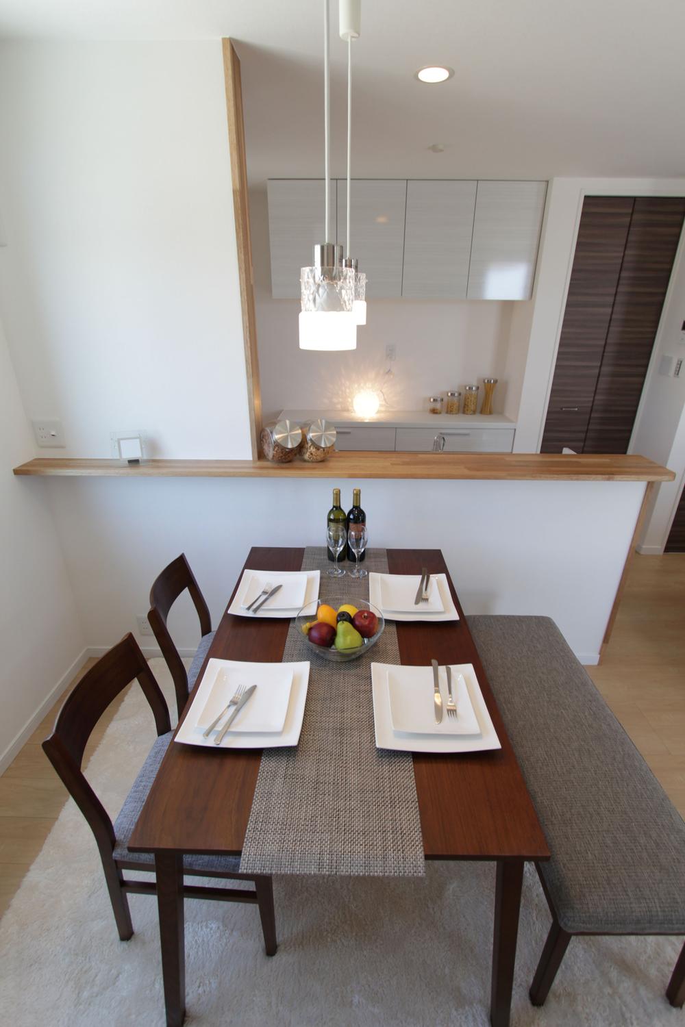 Living. Dining face-to-face with the kitchen conversation of family lively.