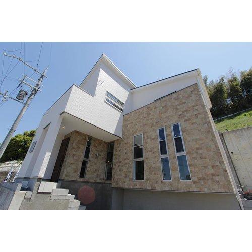 Model house photo. Model house towering on a hill spread is rich vista under eyes