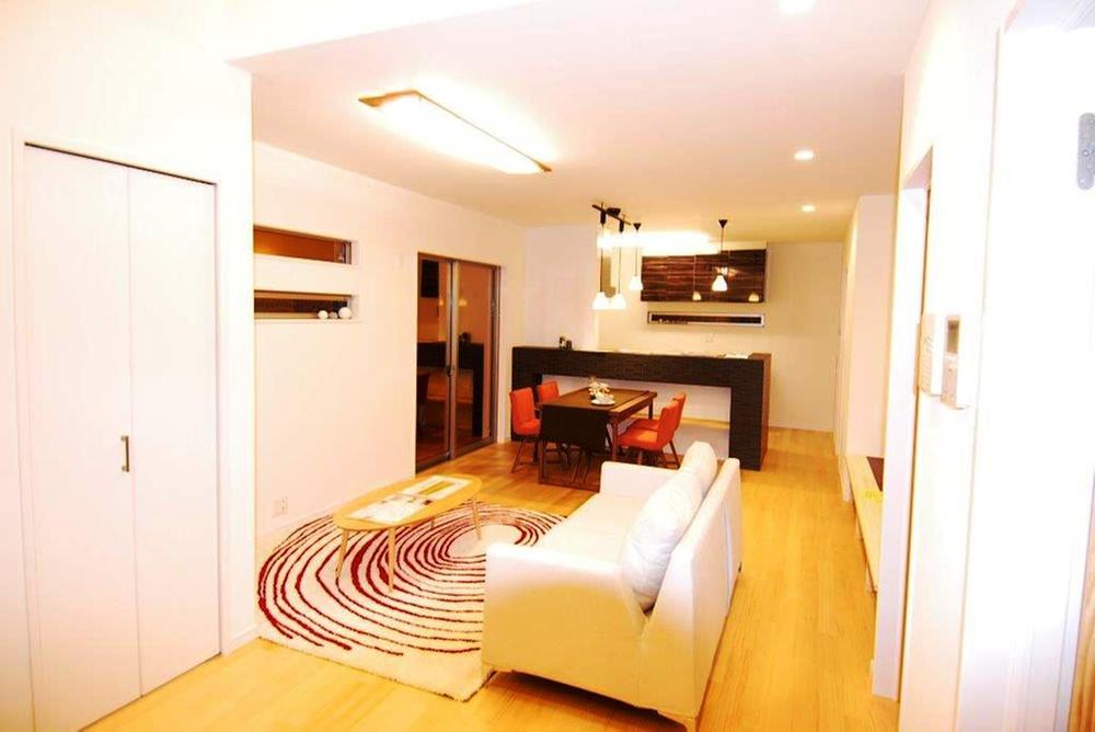 Living. Large living and stylish open kitchen is done a place where families gather in a more cozy space.