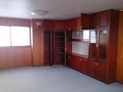 Non-living room. Since it is with a wall store, Luggage will fit a lot.