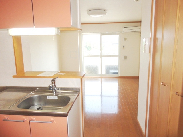 Living and room. Sunny south-facing Western-style rooms are spacious 12.5 Pledge