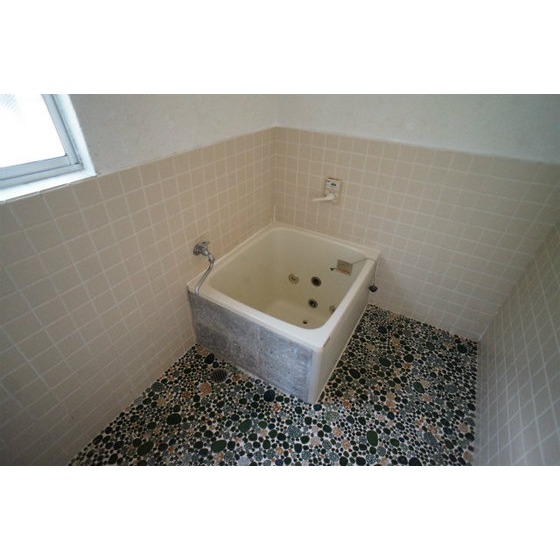 Bath. With small window