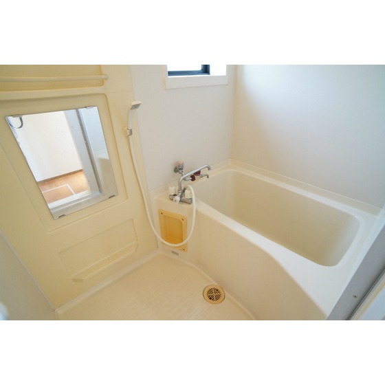 Bath. There is a window in the bath