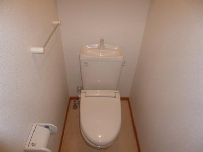 Toilet. A heated toilet seat