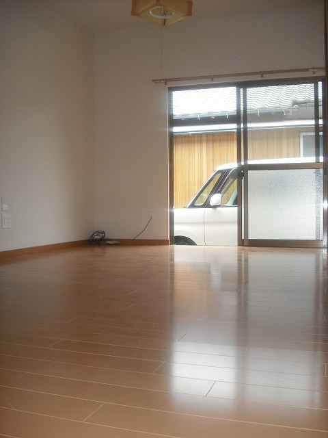 Living and room. Also safe car in front of the eyes of their own private parking room!
